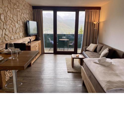 Alpine Studio Apartment by AA Holiday Homes