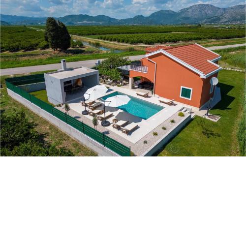 Amazing Home In Opuzen With Outdoor Swimming Pool