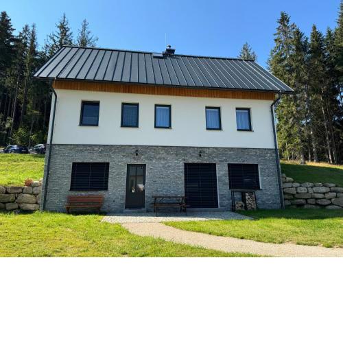 Apartmán U lesa