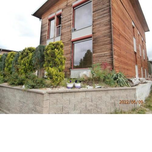 Apartmán v dřevěném domě