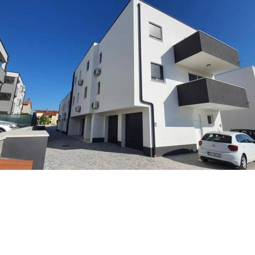 Apartment Sunrise with private parking
