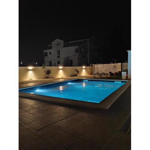Apartments and pool Luminous