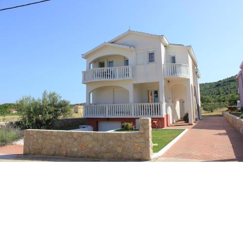 Apartments by the sea Pasman - 8215