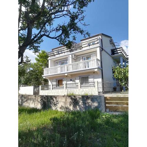 Apartments with a parking space Novi Vinodolski - 15292