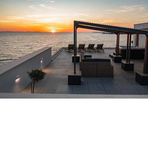 Aqua Blue by Belmont Realty