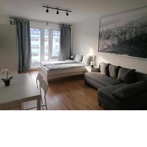 Brand new studio apartment #71 with free secure parking in the center