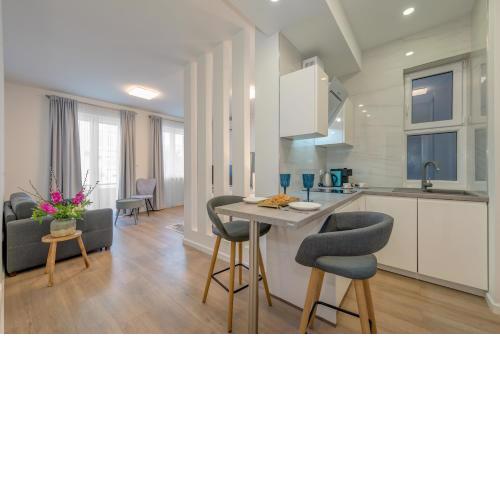 CAPITAL Apartments and Rooms