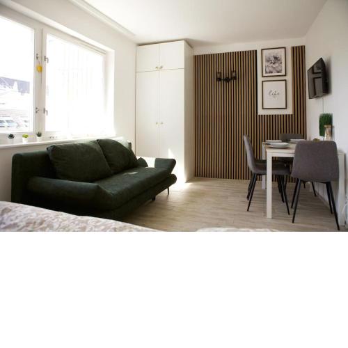 Central Rooftop Apartment with Balcony & AC