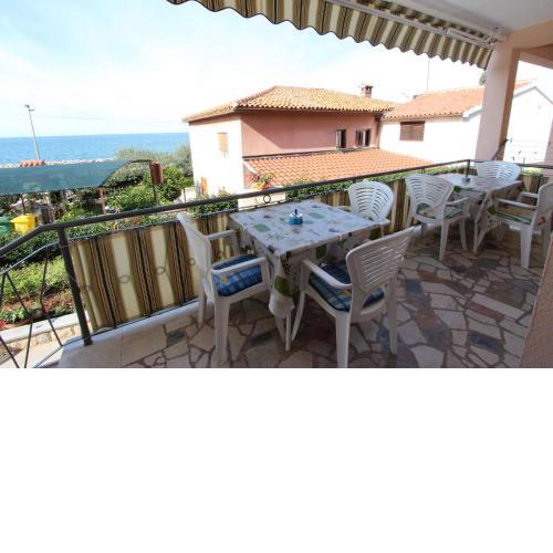 Charmantes Apartment nur 400 Meter zum Strand mit Meerblick, Grillbereich, Klima, WiFi
