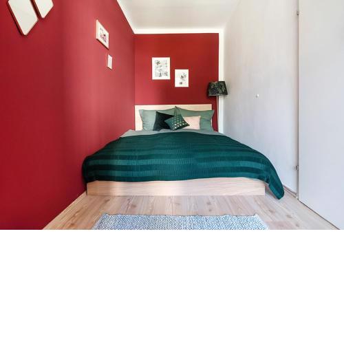 Colorful Apartment Facing Green Courtyard
