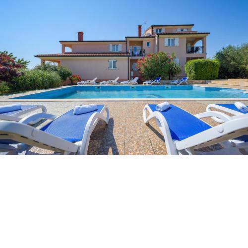 Family friendly apartments with a swimming pool Basanija, Umag - 3402
