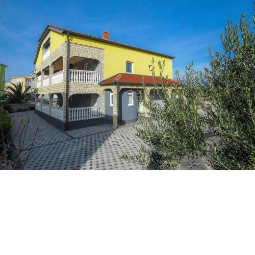 Family friendly apartments with a swimming pool Novalja, Pag - 17052