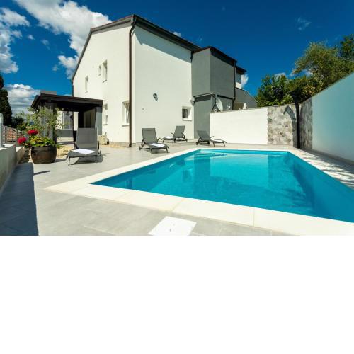 Family friendly apartments with a swimming pool Soline, Krk - 9715