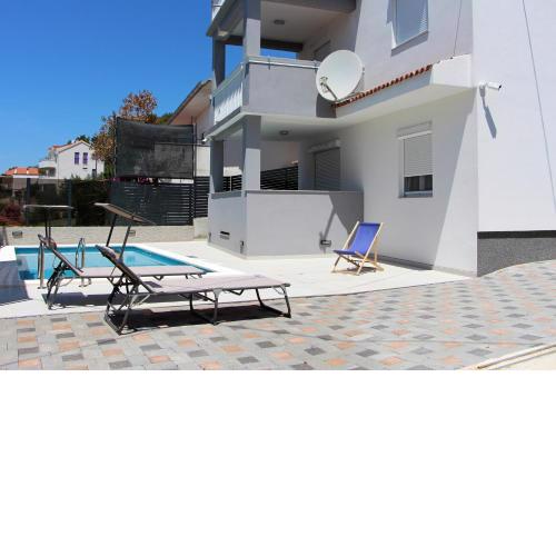 Family friendly apartments with a swimming pool Tisno, Murter - 5073