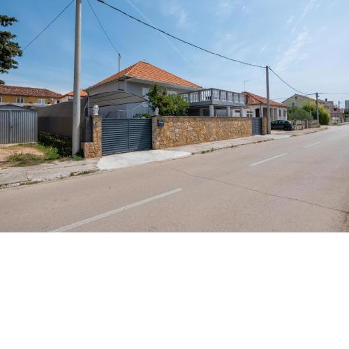 Family friendly apartments with a swimming pool Zadar - 22530