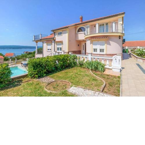 Ferienhaus mit Meerblick & Pool