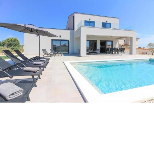 Ferienhaus mit Privatpool für 8 Personen ca 180 qm in Loborika, Istrien Südküste von Istrien