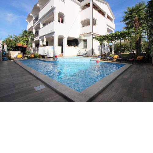 Ferienwohnung in Poreč mit Gepflegtem Garten