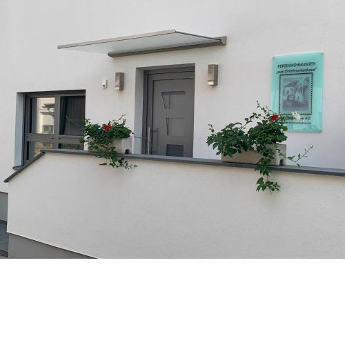 Ferienwohnungen zum Briefmarkenhaus