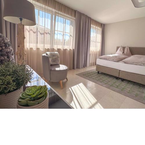 GLÜCKSMOMENT - beeindruckende Ferienwohnung mit shared Poolarea