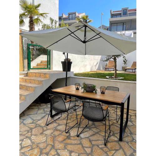 Great outdoor living steps away from the beach