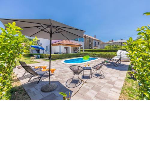 Green paradise with swimming pool