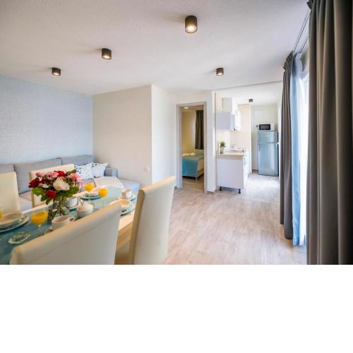 Holiday Home Sea side mobile home by Interhome