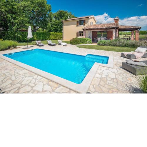Lovely Home In Vosteni With Outdoor Swimming Pool