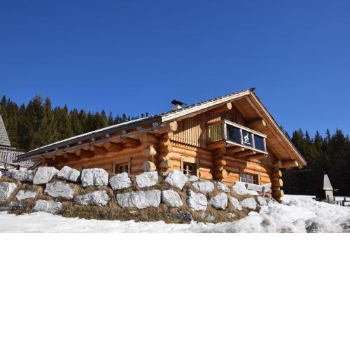 Luxuriöse Blockhütte mit Sauna und Whirlpool