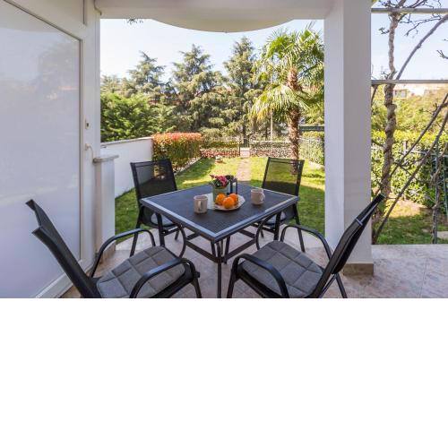 Malerisches Apartment mit mediterranem Garten - nur 450 Meter zum Strand