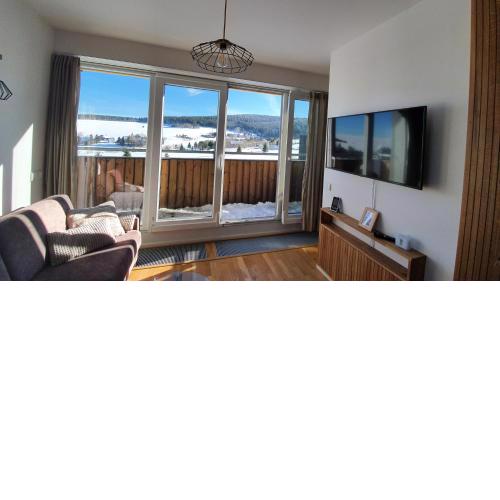 Mezonetový apartmán se dvéma balkóny a výhledem