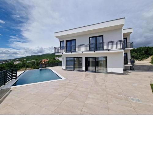Modern villa with swimming pool and sea view