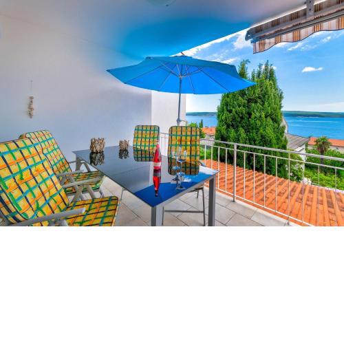 Modernes Apartment nur 350 Meter zum Sandstrand mit Meerblick, eigenem Liegestuhl, Grill