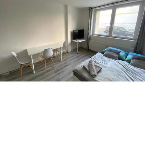 NOVÝ krásný apartmán - 15 min od centra