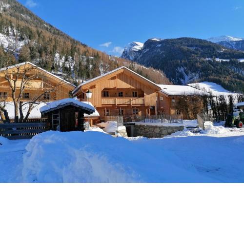 Schlosswirt Chalets & Apartments