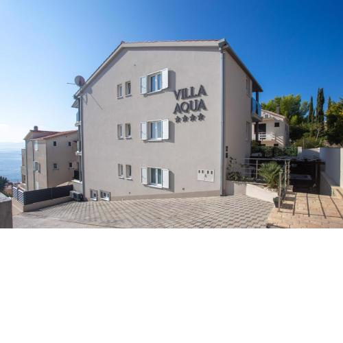 Seaside apartments with a swimming pool Businci, Ciovo - 21999