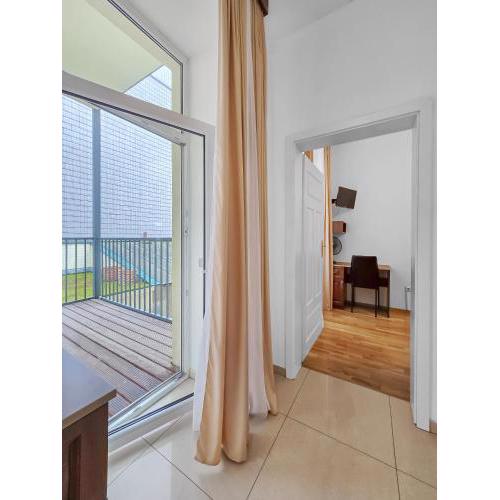 Spacious 3-Bedroom Retreat with Balcony for 8 Near Millennium Tower
