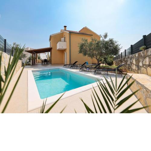 Spacious holiday home with swimming pool