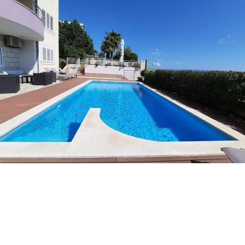 SUN apartment with SEA VIEW and shared POOL
