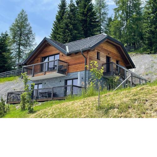 Tomtegl-Bergchalet-No-13-mit-Privatsauna-Infinitypool-Kamin-Fitnessraum-1500m-Seehoehe