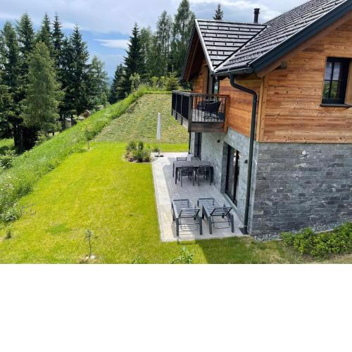 Tomtegl-Bergchalet-No-3-mit-Privatsauna-Infinitypool-Kamin-Fitnessraum-1500m-Seehoehe