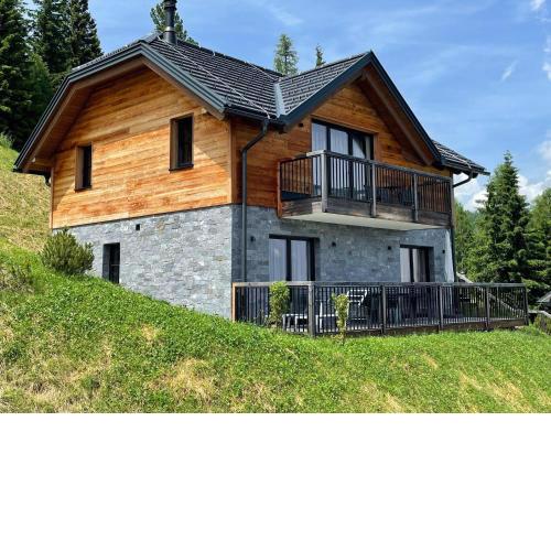 Tomtegl-Bergchalet-No-9-mit-Privatsauna-Infinitypool-Kamin-Fitnessraum-1500m-Seehoehe