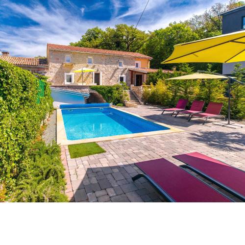 Villa Cati Ferienhaus mit beheiztem Pool