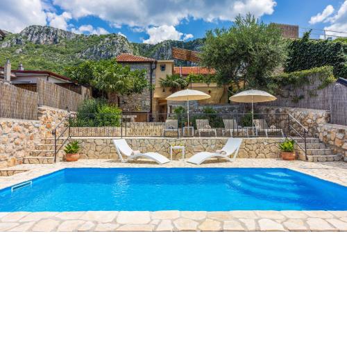 Villa Cocoon - Vacation Home with Heated Pool & Garden
